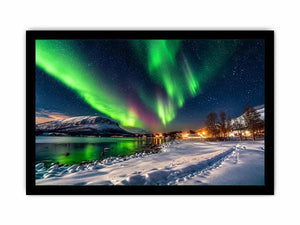 Northern lights over a winter village