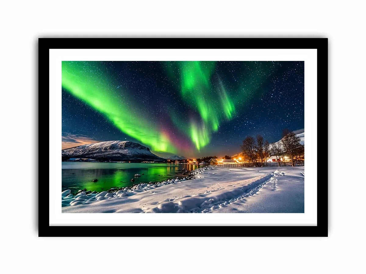 Northern lights over a winter village