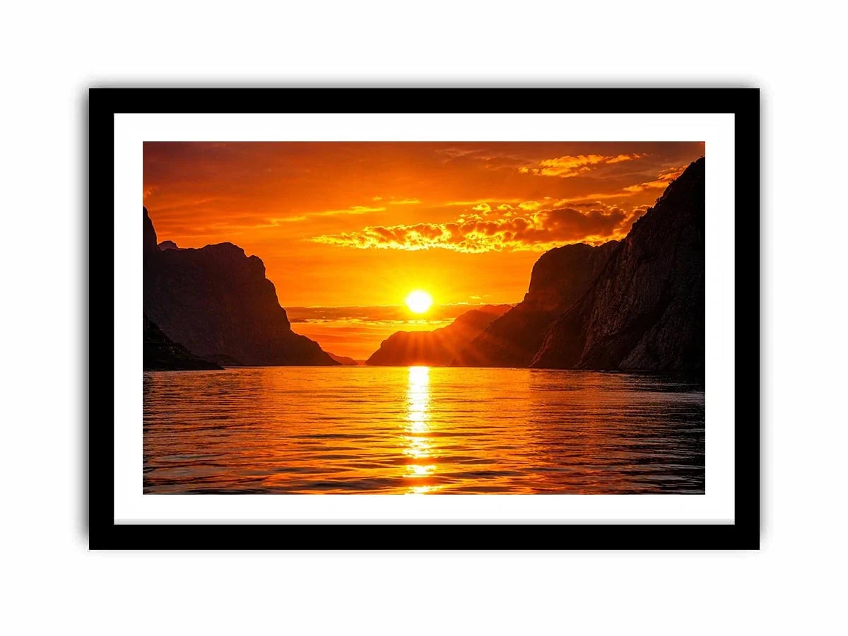 Golden sunset over fjord cliffs