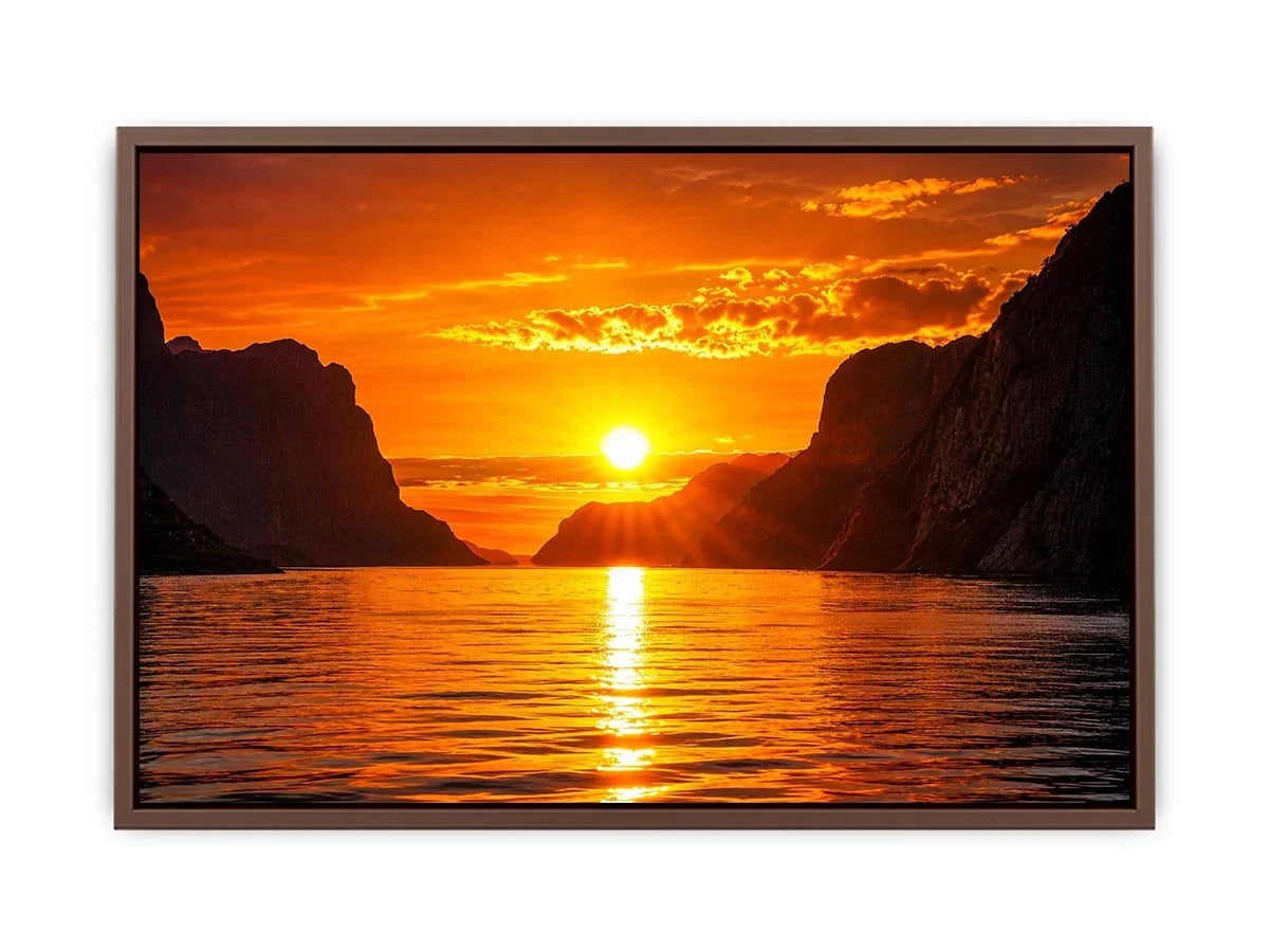 Golden sunset over fjord cliffs