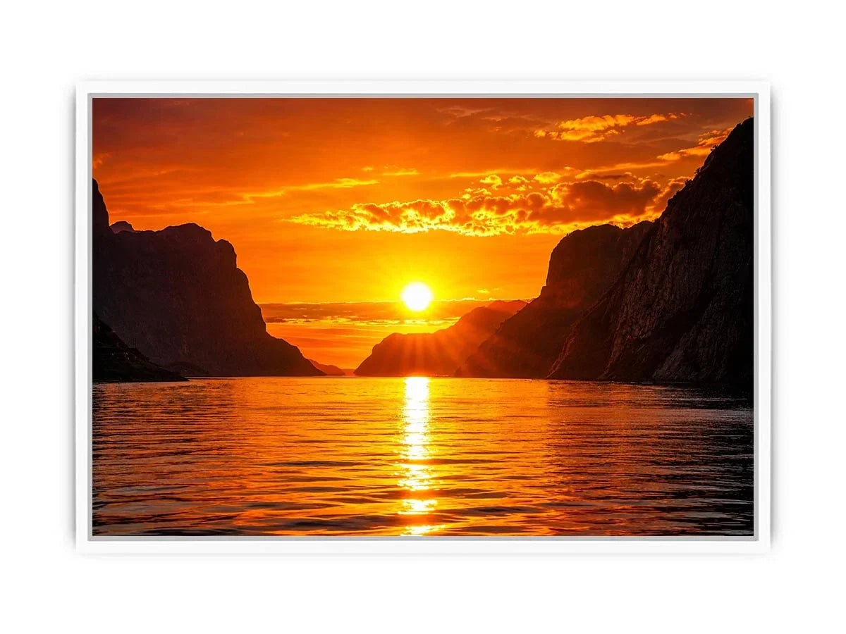 Golden sunset over fjord cliffs