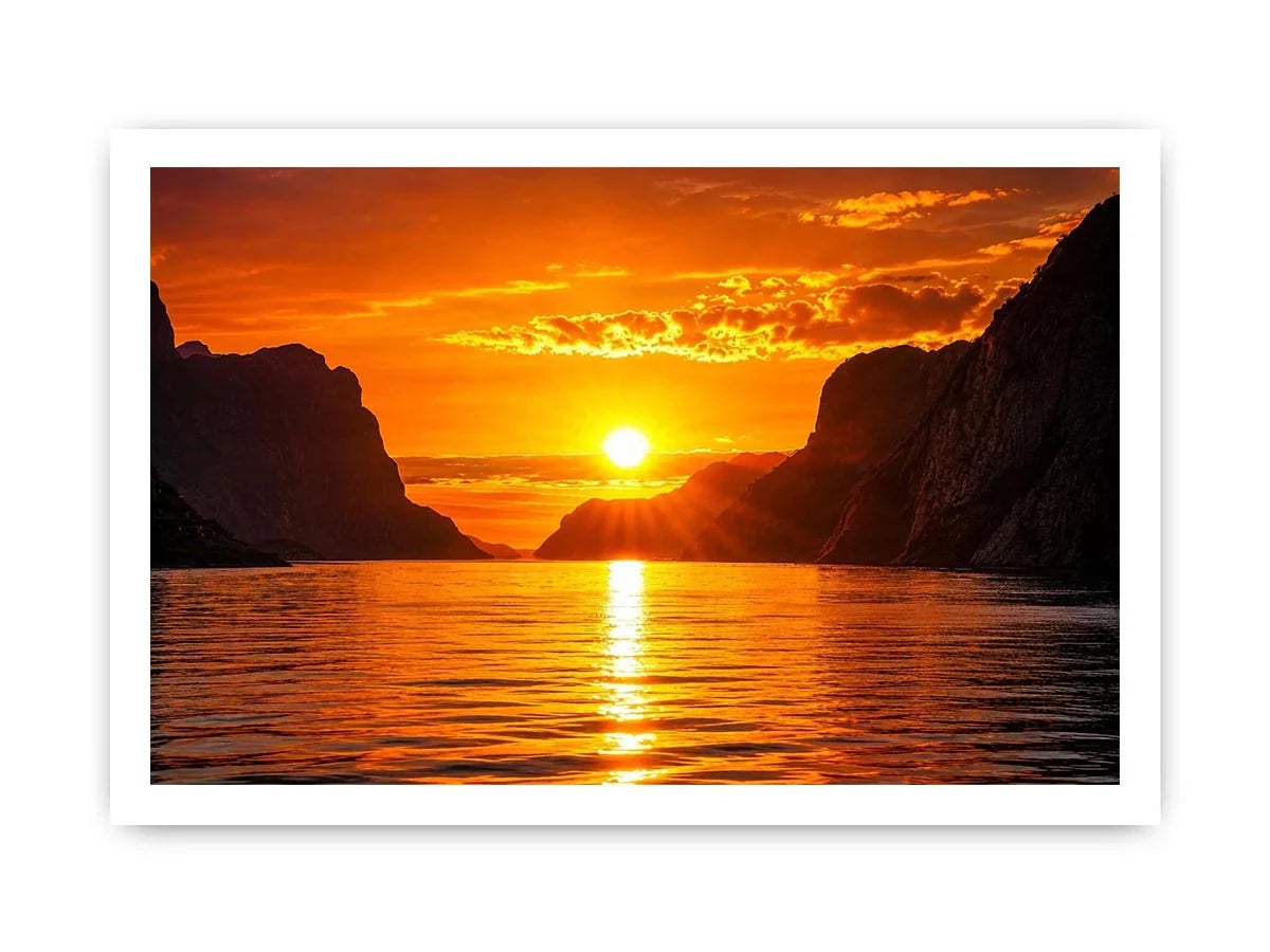 Golden sunset over fjord cliffs