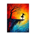 Dancing silhouette against fiery sunset