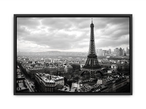 Eiffel Tower amid Parisian skyline haze