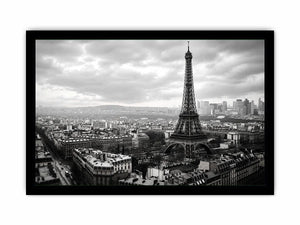 Eiffel Tower amid Parisian skyline haze