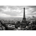 Eiffel Tower amid Parisian skyline haze