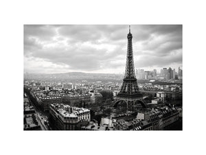 Eiffel Tower amid Parisian skyline haze