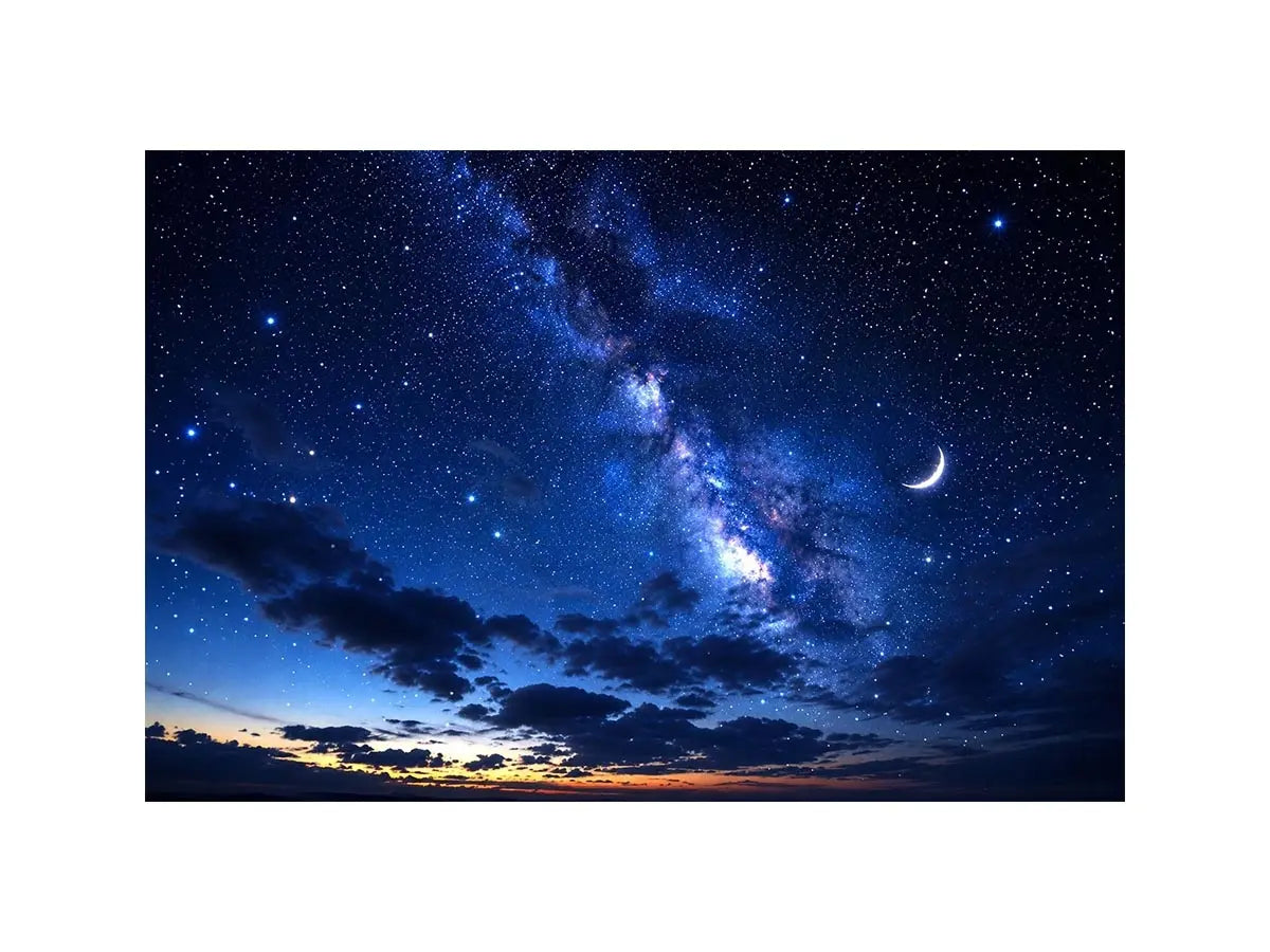 Starry night with crescent moon and clouds