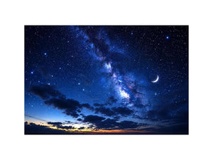 Starry night with crescent moon and clouds