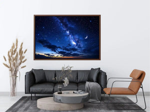 Starry night with crescent moon and clouds