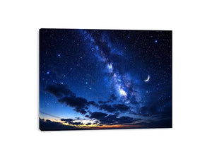 Starry night with crescent moon and clouds