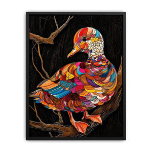 Vibrant mosaic duck perched on branch