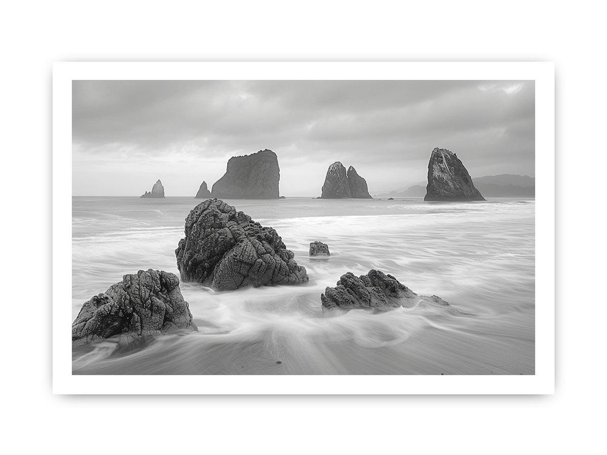 Black and white coastal landscape photography for serene living room decor