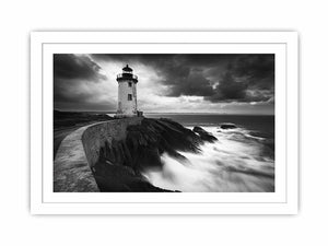 Moody black and white lighthouse Canvas Print with storm clouds