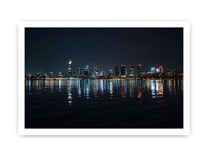 Night city skyline artwork with reflections