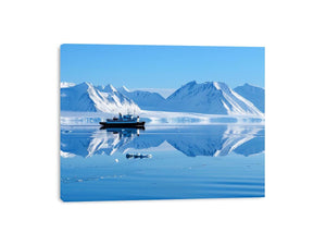 Arctic ship and snowy mountain