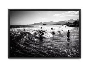 black and white surfing wave with surfers ocean Canvas Print canvas