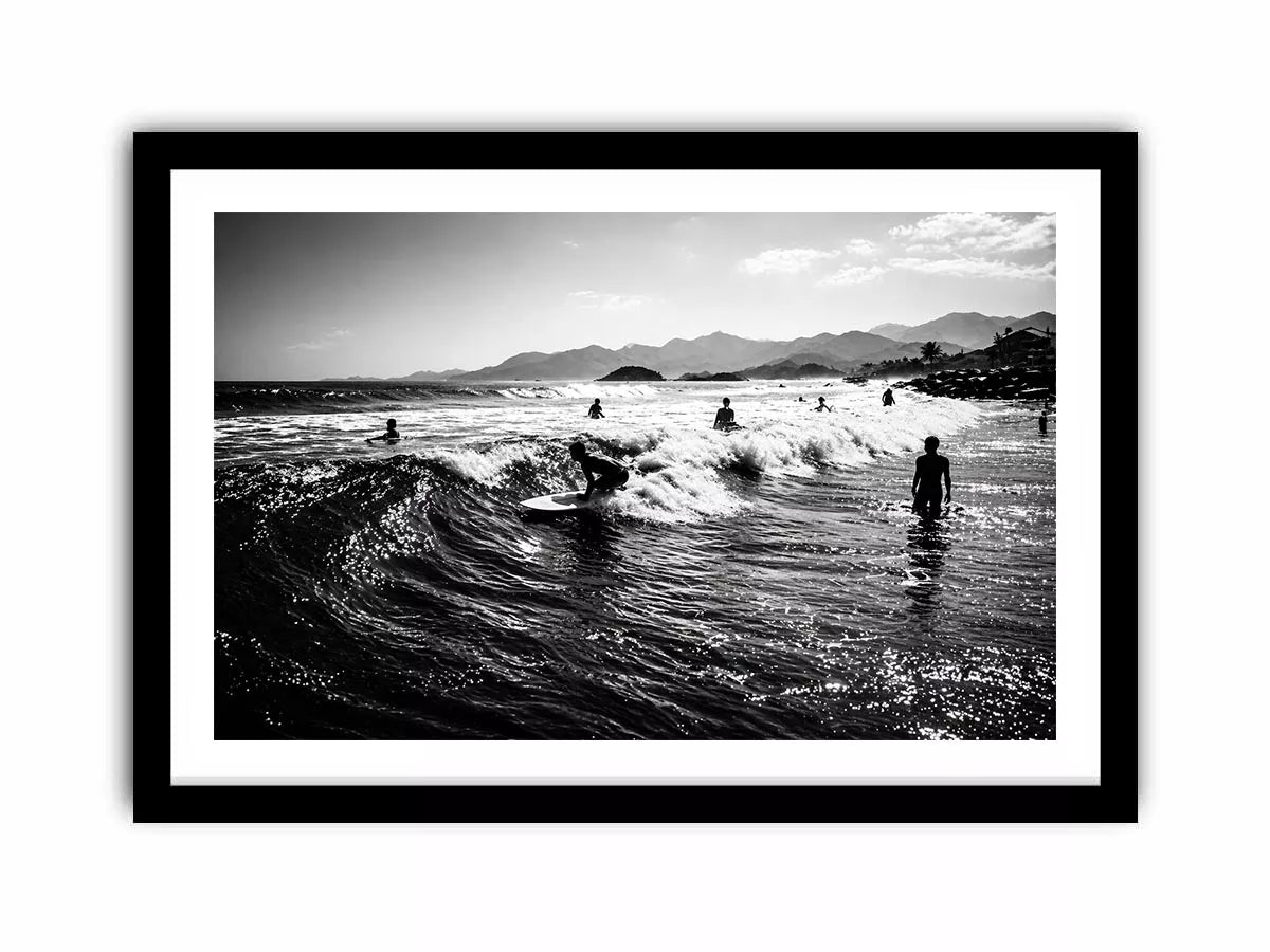 black and white surfing wave with surfers ocean Canvas Print canvas