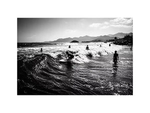 black and white surfing wave with surfers ocean Canvas Print canvas
