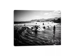 black and white surfing wave with surfers ocean Canvas Print canvas