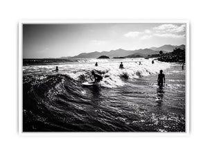 black and white surfing wave with surfers ocean Canvas Print canvas