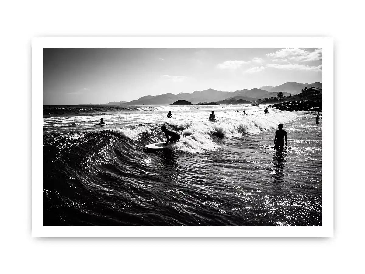 black and white surfing wave with surfers ocean Canvas Print canvas