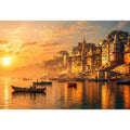 sunset and boat in the Ganga river varanasi india