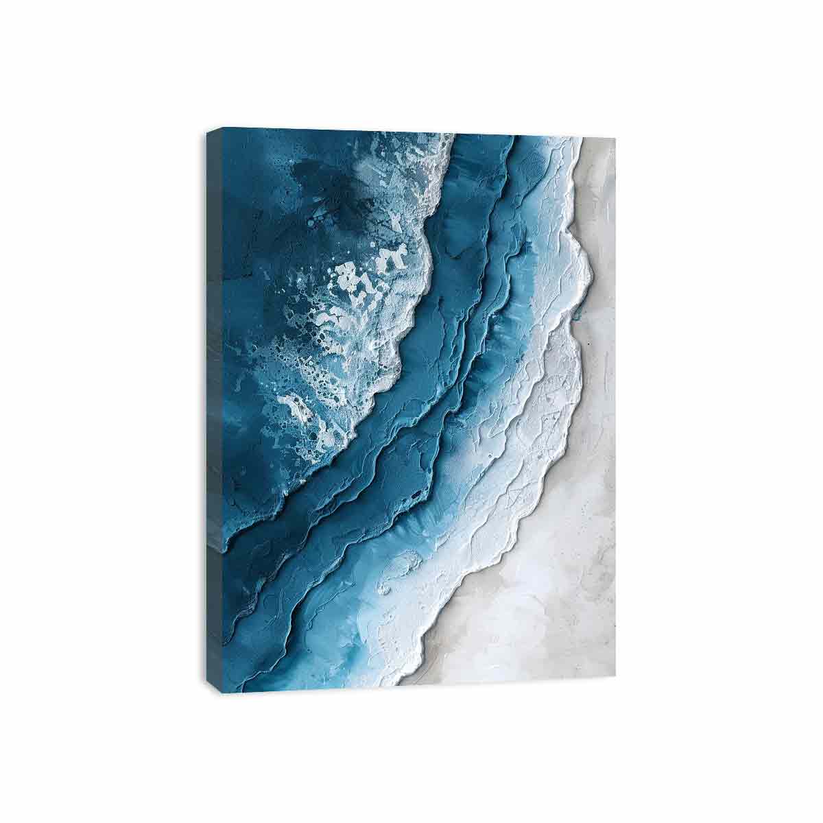 Textured abstract ocean wave canvas art in blue and white for coastal decor.