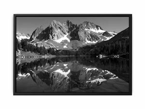Black and white alpine mountain lake canvas art with reflection for peaceful modern living room decor.