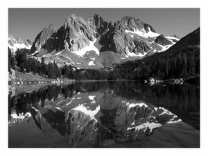 Black and white alpine mountain lake canvas art with reflection for peaceful modern living room decor.