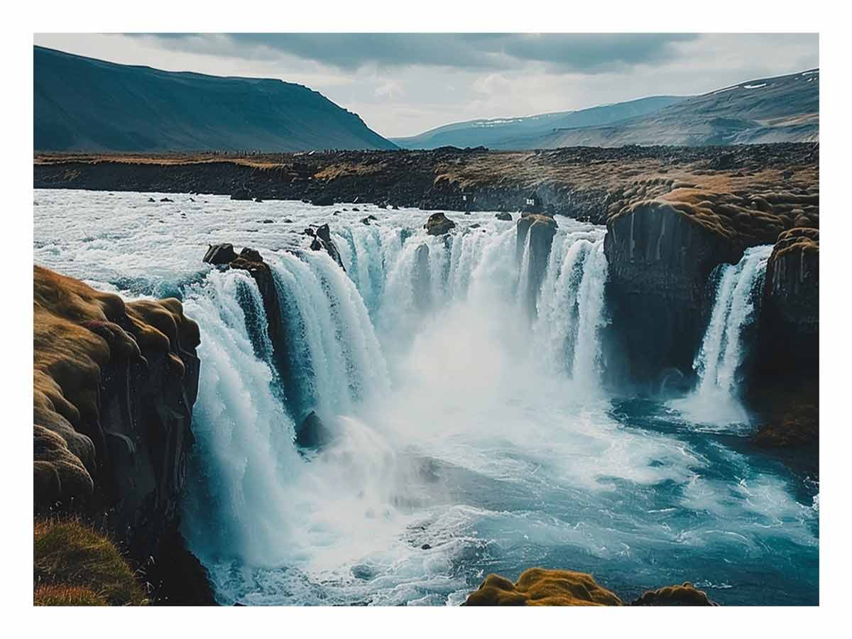 Dramatic Nordic waterfall canvas print with blue water and rugged cliffs for modern living room decor.