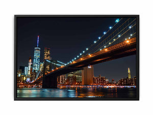 Brooklyn Bridge night canvas art with city skyline and water reflections for office decor.