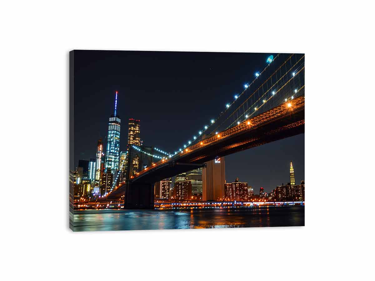 Brooklyn Bridge night canvas art with city skyline and water reflections for office decor.