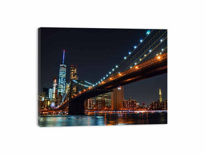 Brooklyn Bridge night canvas art with city skyline and water reflections for office decor.