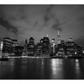 Black and white night skyline canvas art for apartment or office decor.
