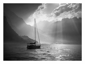 Black and white sailboat lake canvas art for calm modern interiors.
